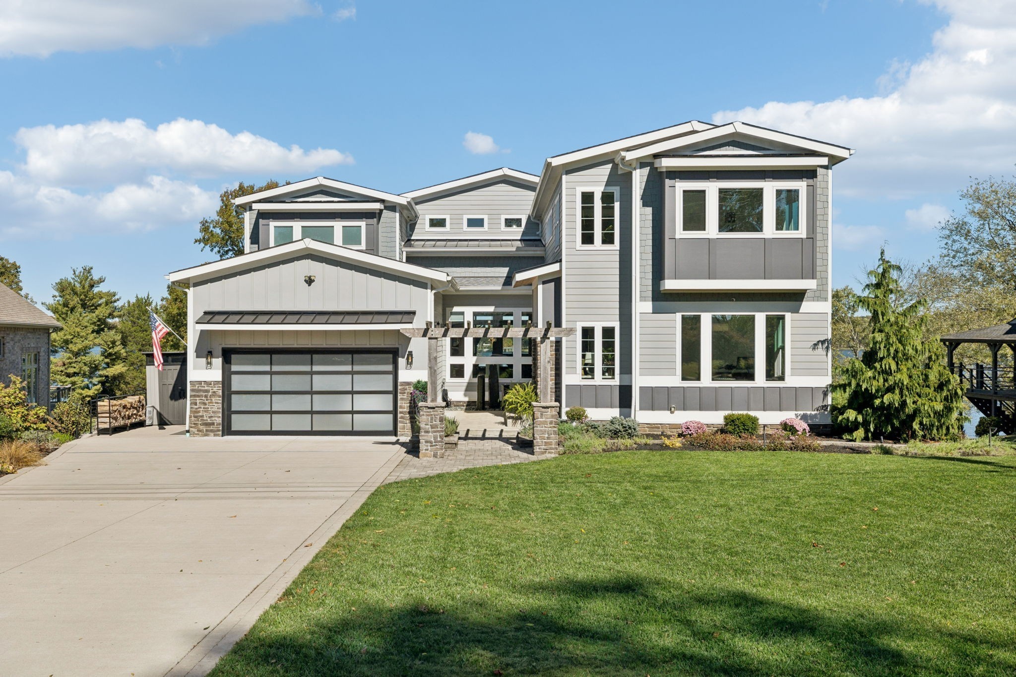 809 Burton Point Road Mount Juliet, TN 37122 - Photo 5 of 75 a front view of a house with a yard and garage