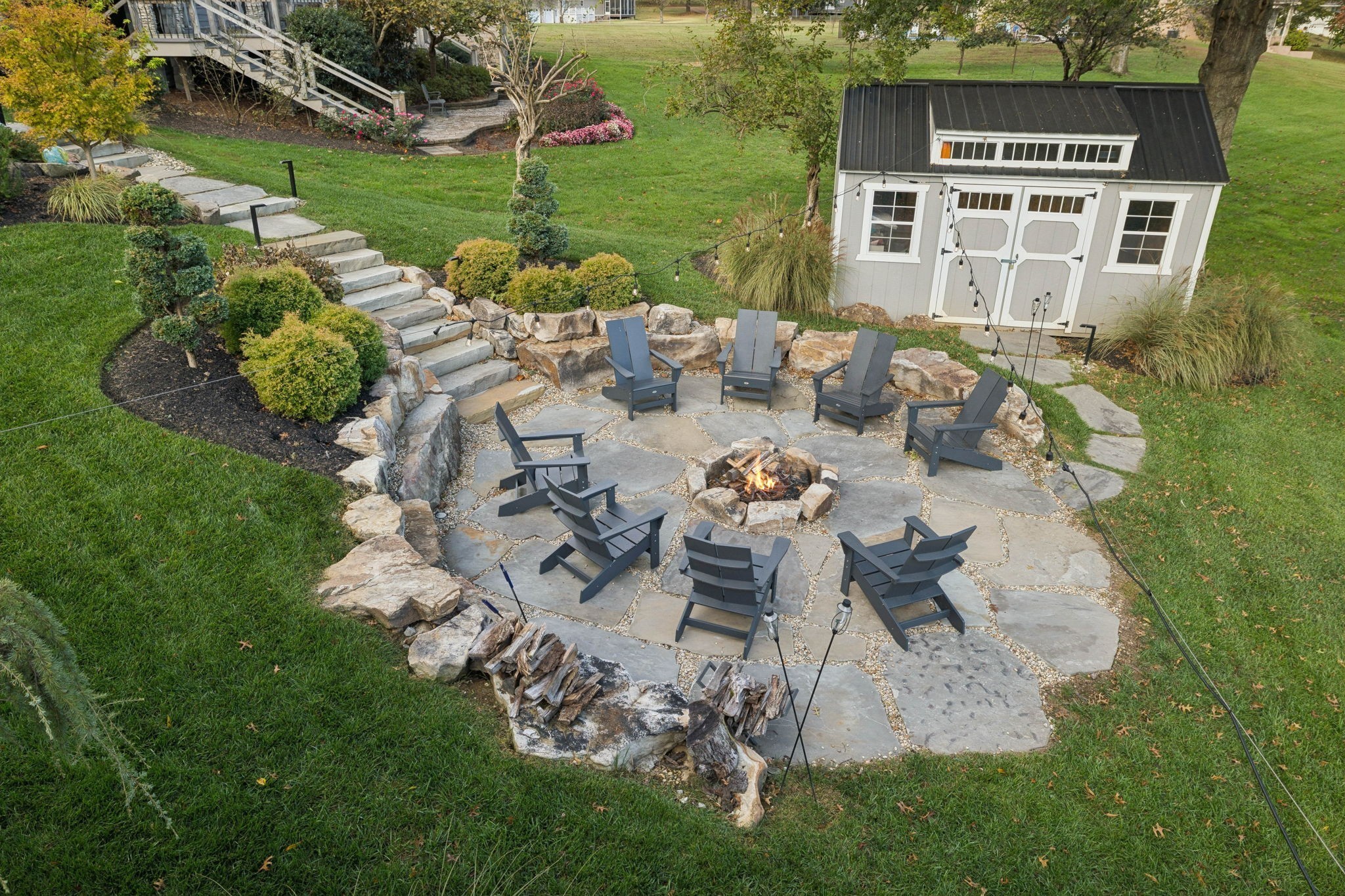 809 Burton Point Road Mount Juliet, TN 37122 - Photo 72 of 75 a picture of table and chairs with wooden fence