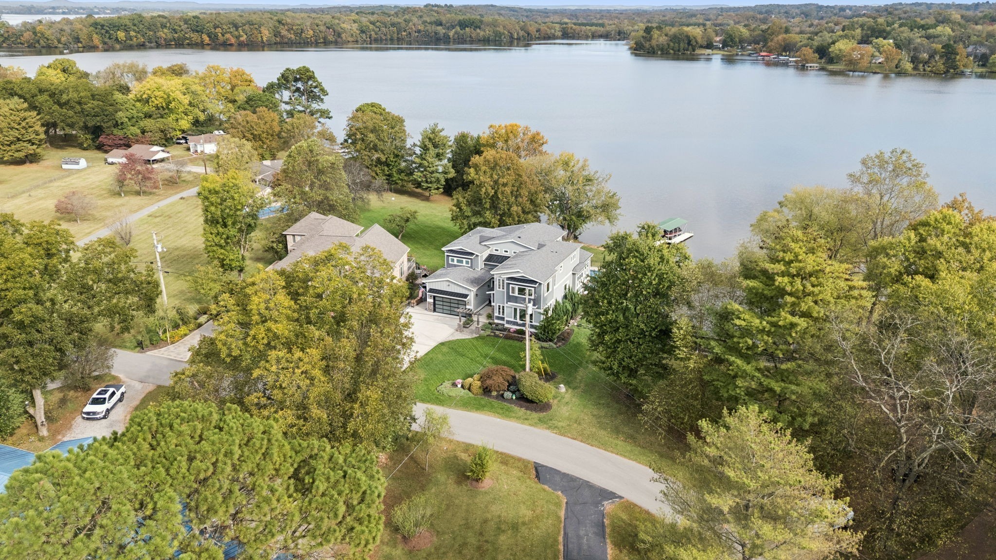 809 Burton Point Road Mount Juliet, TN 37122 - Photo 74 of 75 a view of a lake with a mountain view