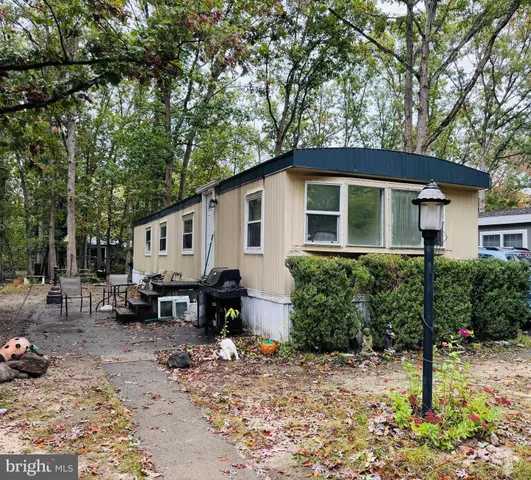 a view of a house with a patio