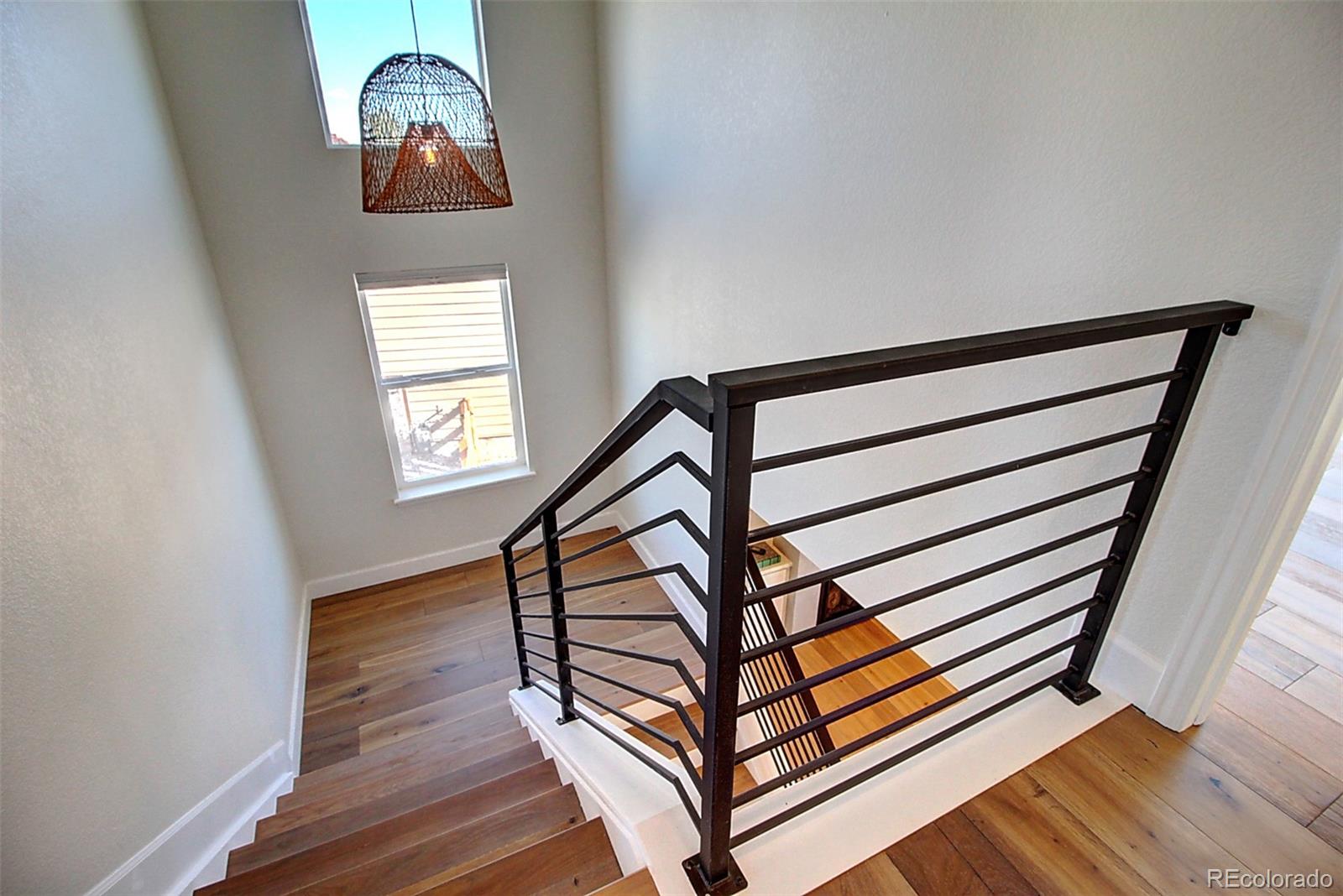 1013 Gabriella Lane Berthoud, CO 80513 - Photo 17 of 39 a view of staircase with a rug