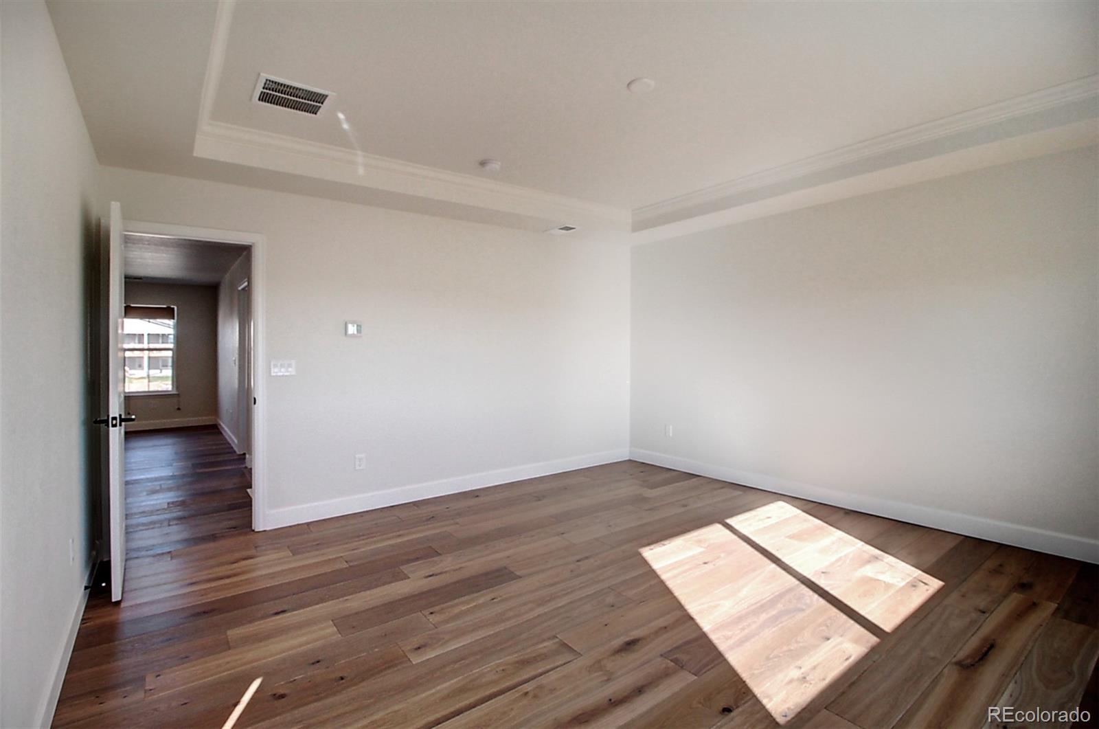 1013 Gabriella Lane Berthoud, CO 80513 - Photo 31 of 39 wooden floor in an empty room