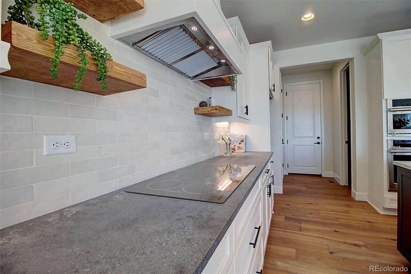1013 Gabriella Lane Berthoud, CO 80513 - Photo 6 of 39 wooden floor in an empty room