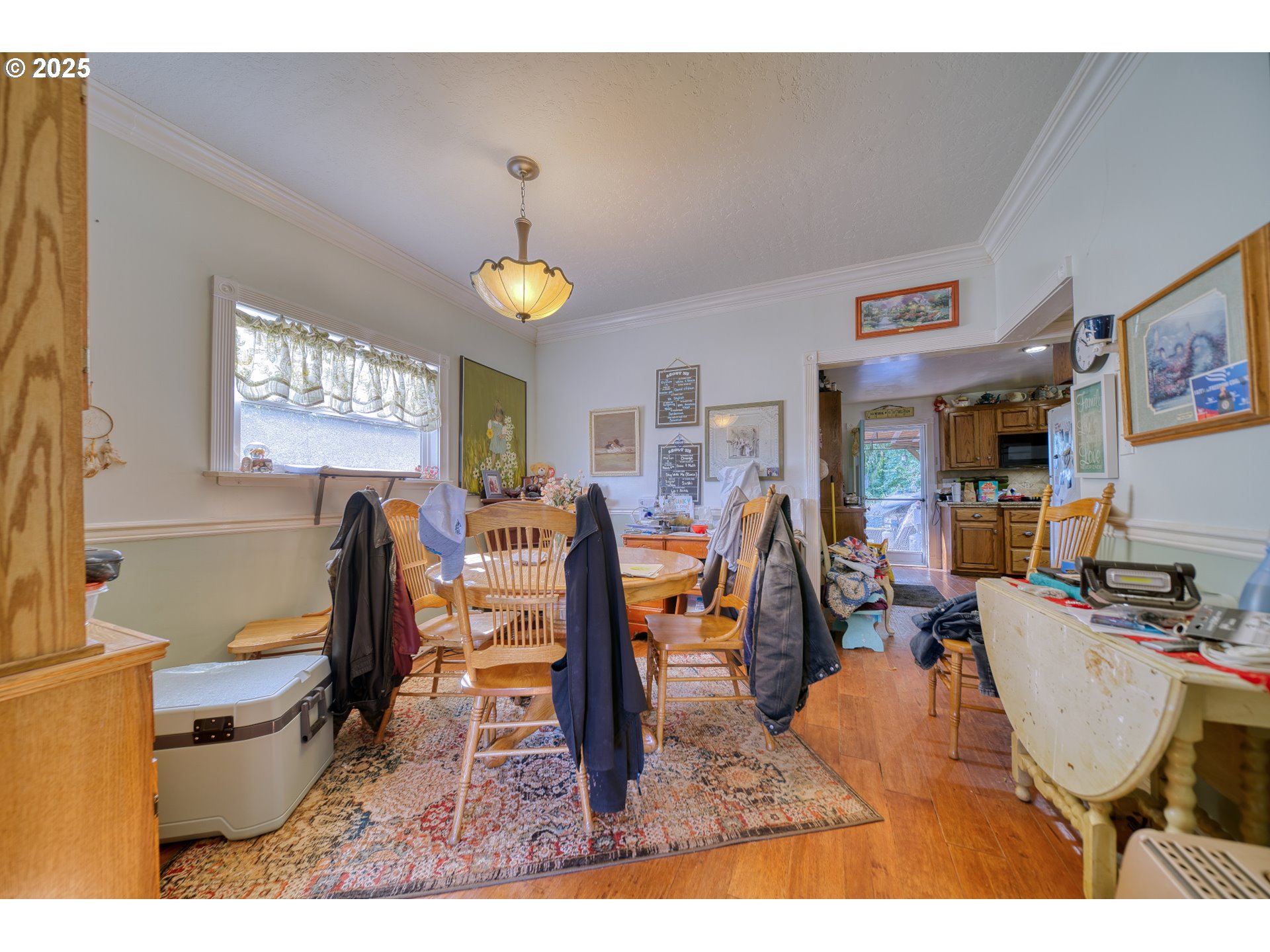 324 West F Street Rainier, OR 97048 - Photo 12 of 25 a view of a dining room with furniture