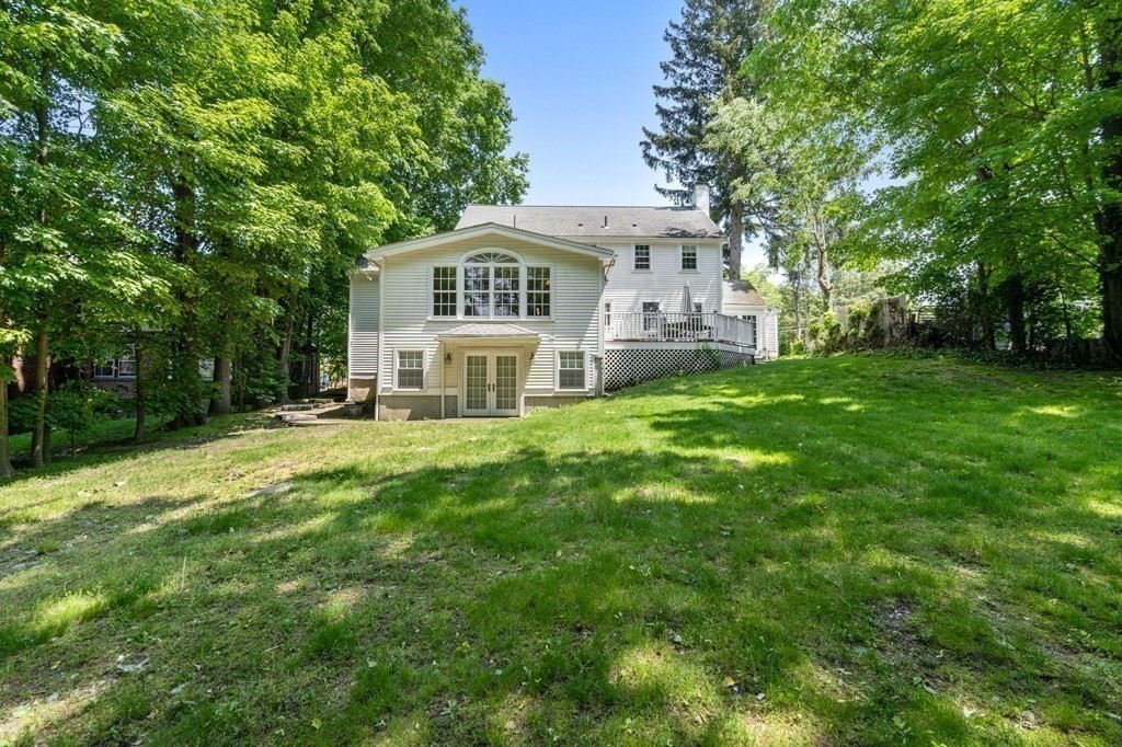 a view of a house with a big yard