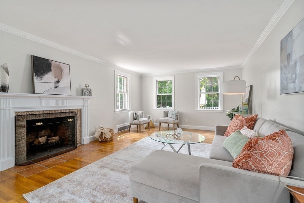 23 Ashford Road Newton, MA 02459 - Photo 11 of 35 a living room with furniture and a fireplace