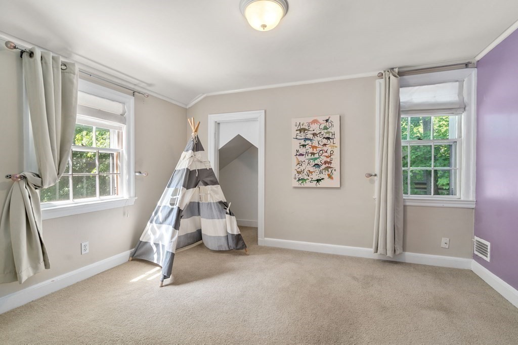23 Ashford Road Newton, MA 02459 - Photo 19 of 35 an empty room with windows and white walls