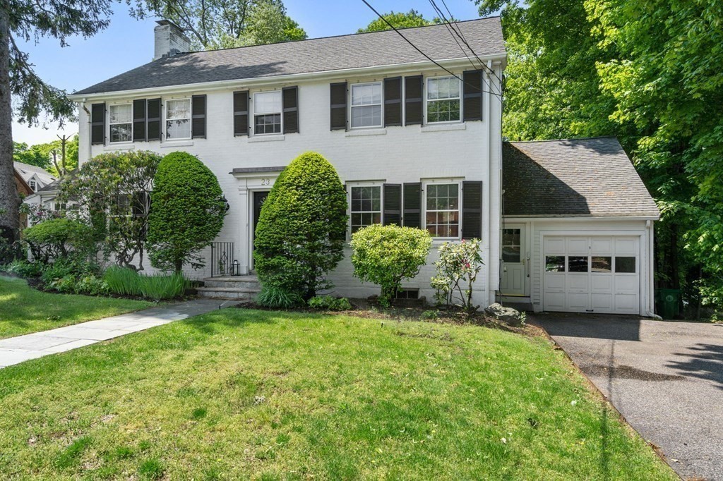 23 Ashford Road Newton, MA 02459 - Photo 30 of 35 a front view of a house with a garden and plants