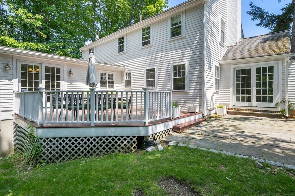23 Ashford Road Newton, MA 02459 - Photo 32 of 35 a front view of a house with a garden