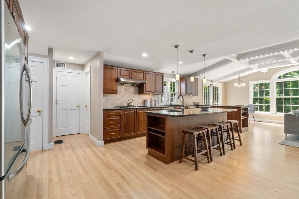 23 Ashford Road Newton, MA 02459 - Photo 4 of 35 a large kitchen with a table and chairs in it