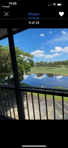 a view of swimming pool from a balcony