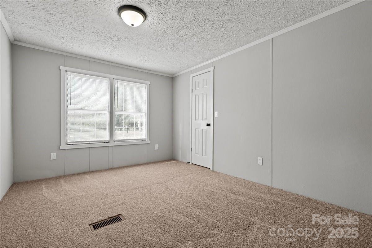 273 Adams Road Chesterfield, SC 29709 - Photo 14 of 47 a view of an empty room with a window