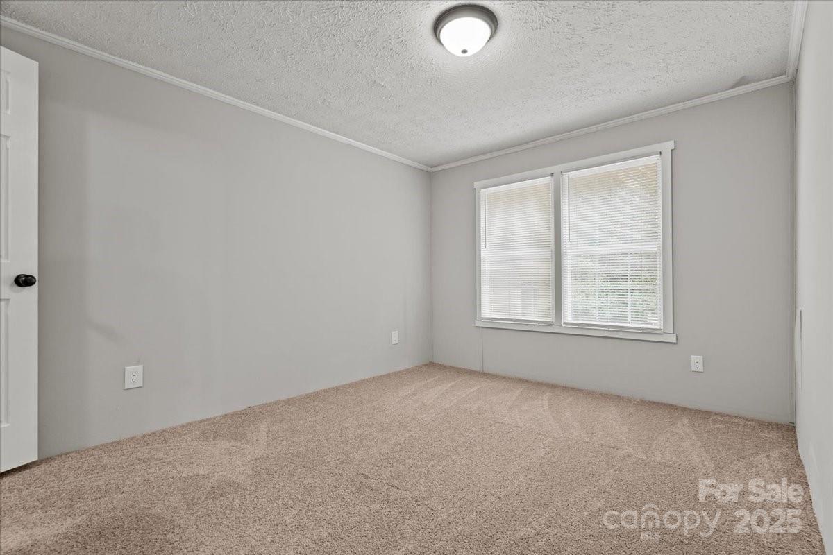 273 Adams Road Chesterfield, SC 29709 - Photo 17 of 47 an empty room with windows