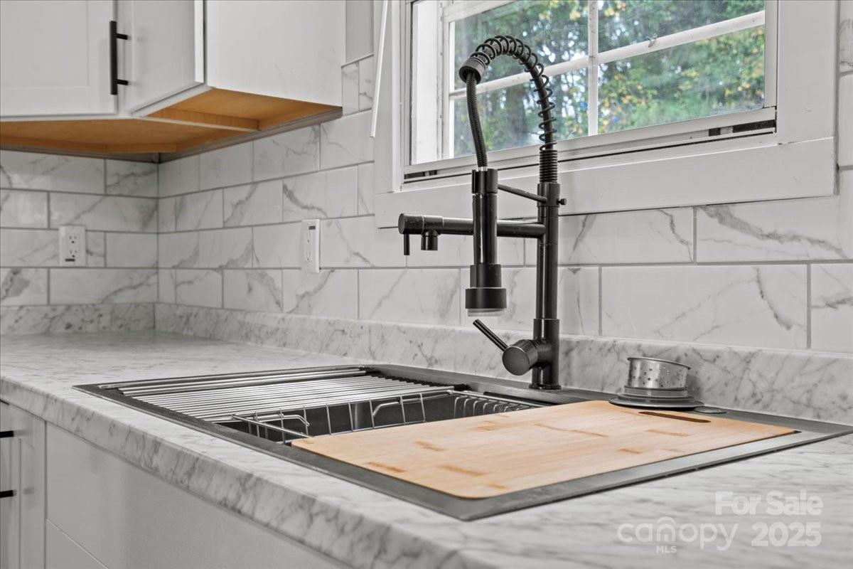 273 Adams Road Chesterfield, SC 29709 - Photo 22 of 47 a stove top oven sitting inside of a kitchen