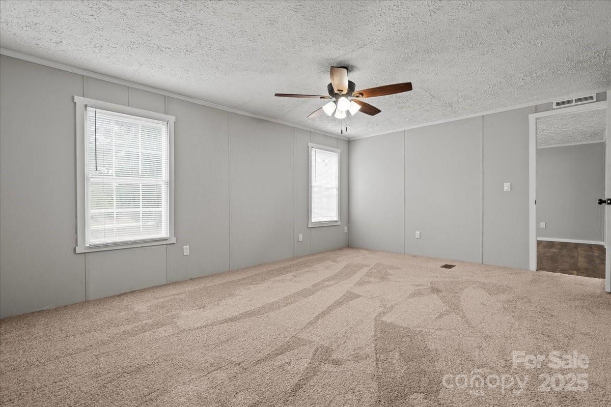 273 Adams Road Chesterfield, SC 29709 - Photo 32 of 47 a view of an empty room with a window