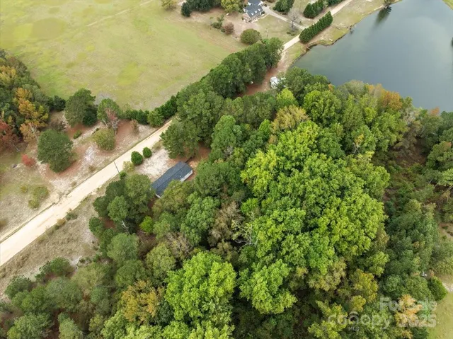 a view of a lake with a yard