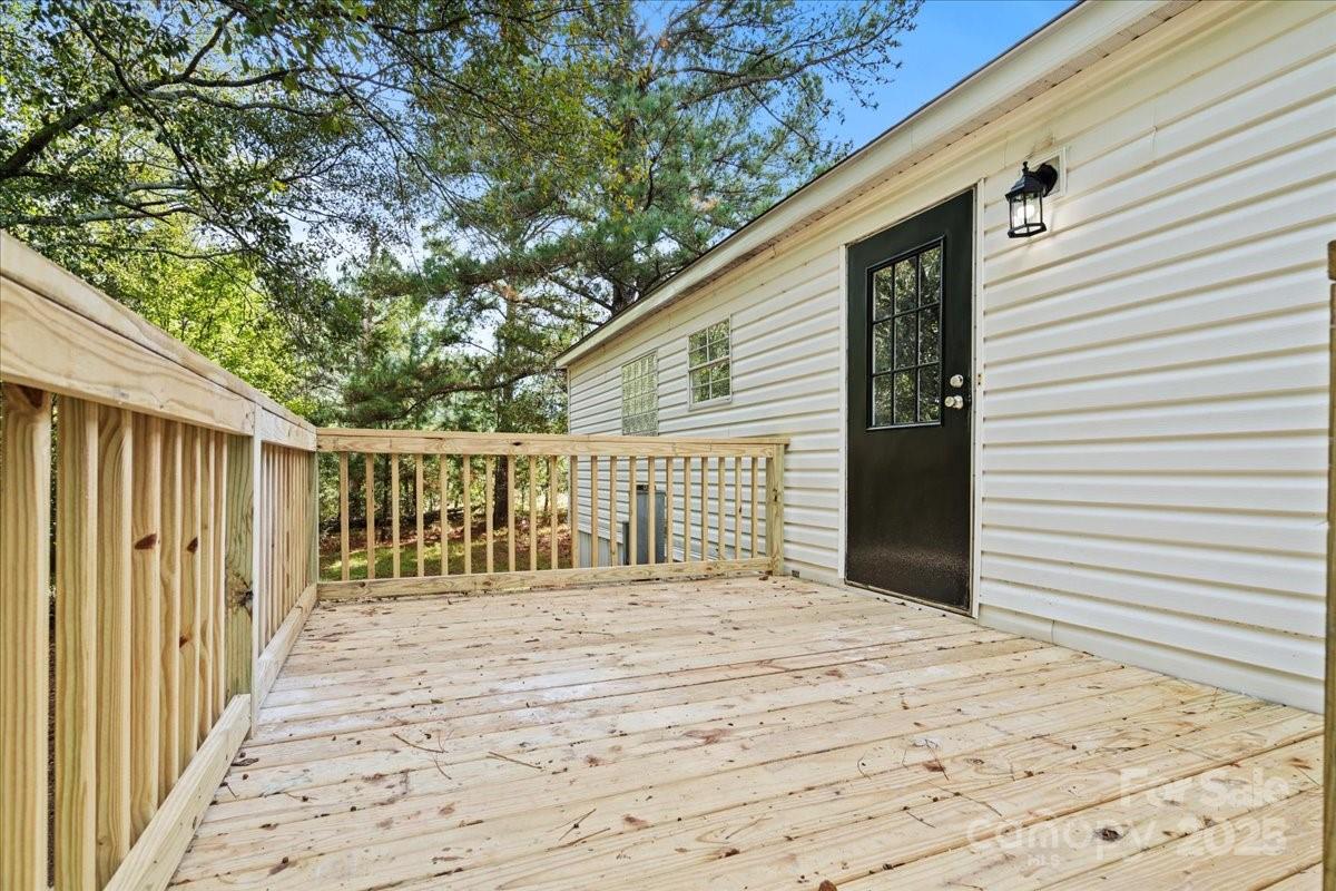 273 Adams Road Chesterfield, SC 29709 - Photo 45 of 47 a view of a house with a wooden deck