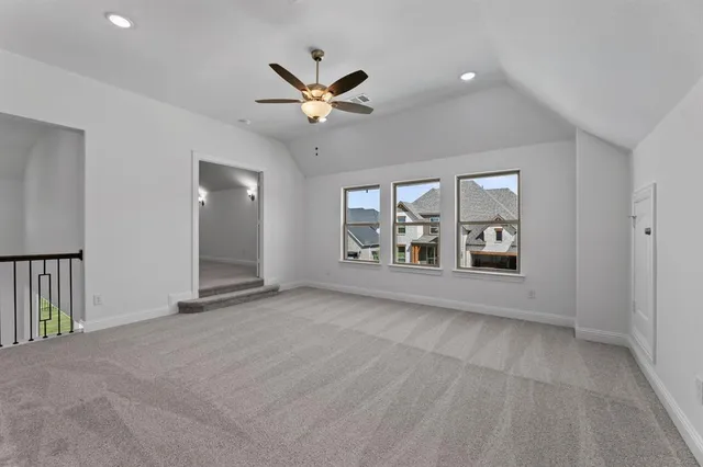 a kitchen with white cabinets and a sink