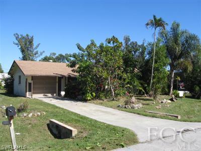 a view of a backyard with a garden