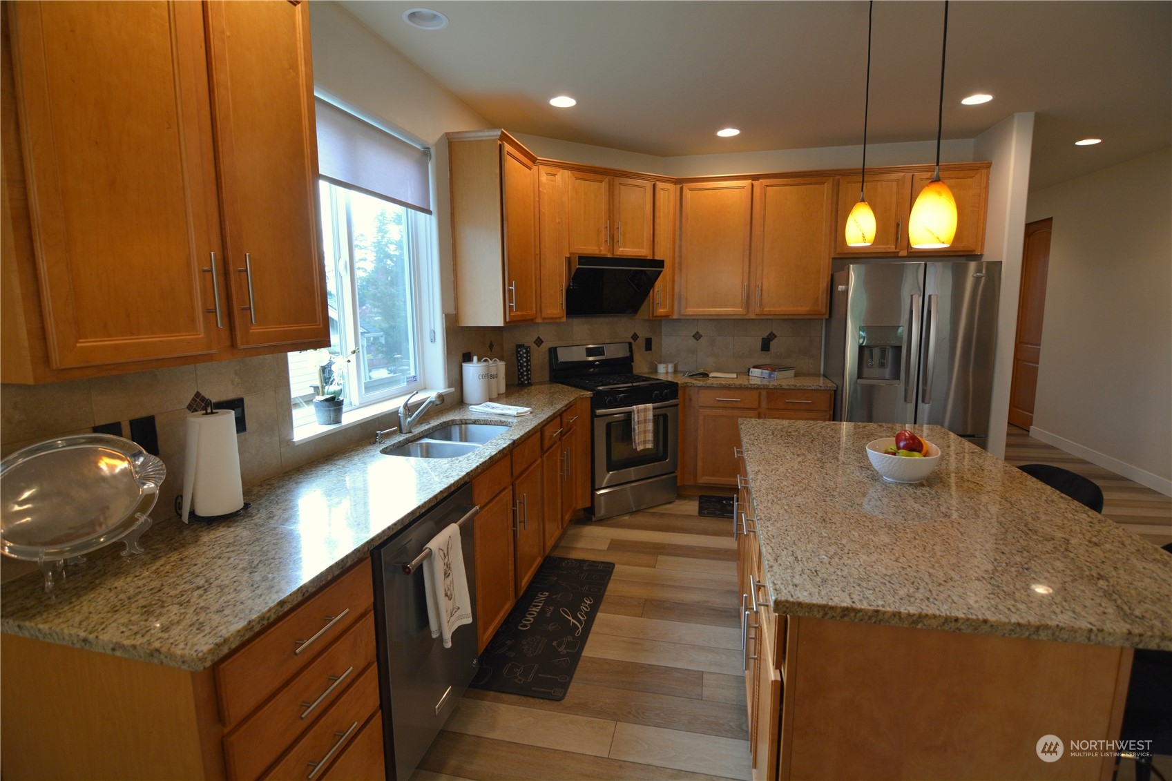 21 233rd Place Southeast Bothell, WA 98021 - Photo 12 of 33 a kitchen with lots of counter space and a sink
