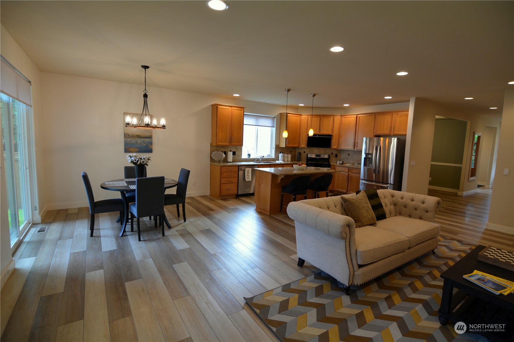 21 233rd Place Southeast Bothell, WA 98021 - Photo 17 of 33 a living room with furniture and wooden floor