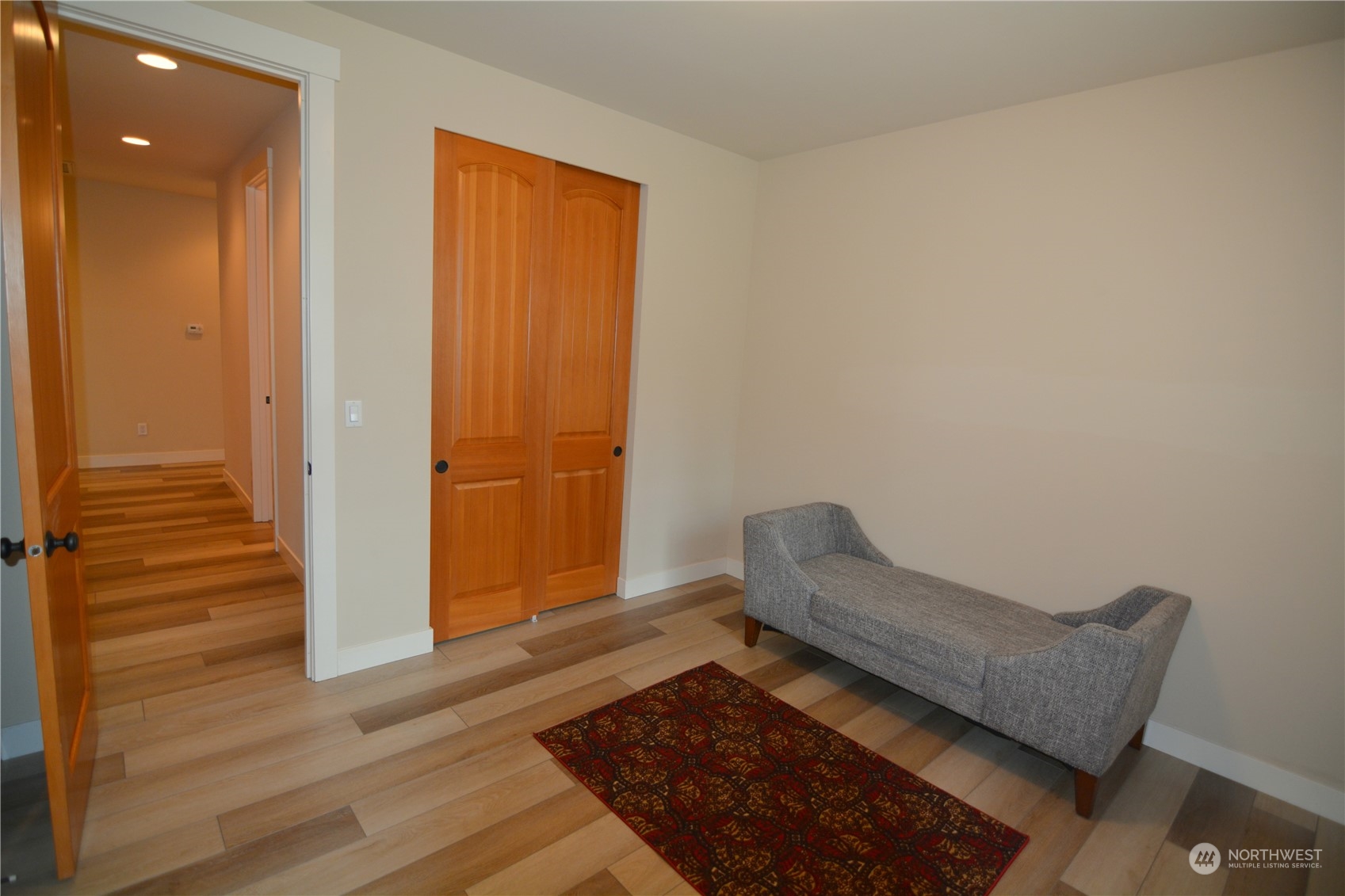21 233rd Place Southeast Bothell, WA 98021 - Photo 24 of 33 a living room with a couch and wooden floor