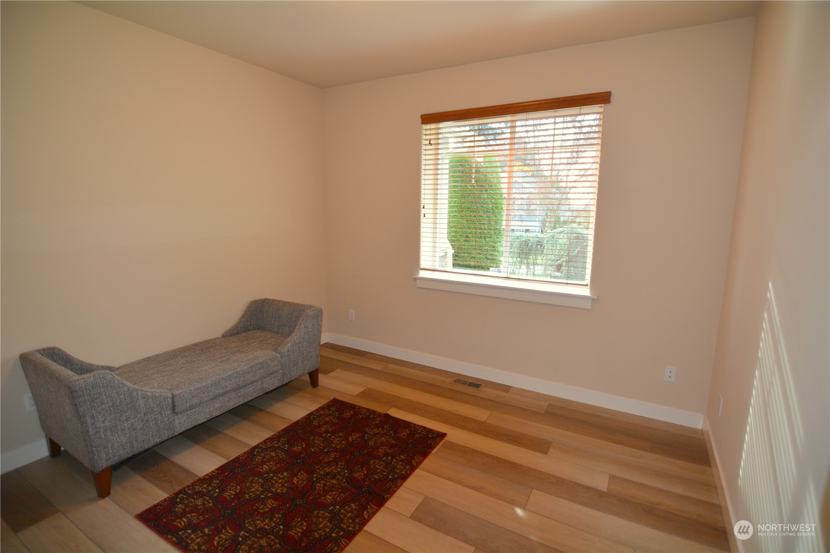 21 233rd Place Southeast Bothell, WA 98021 - Photo 25 of 33 a living room with furniture and a window