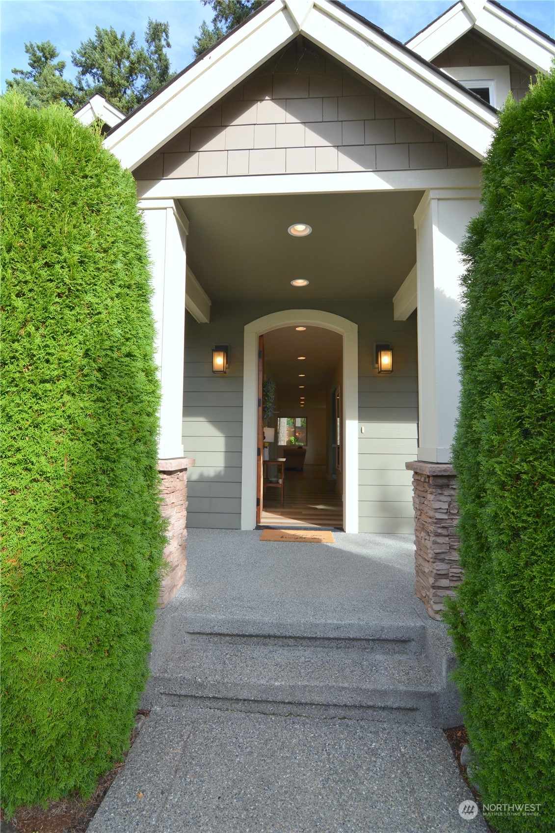 21 233rd Place Southeast Bothell, WA 98021 - Photo 3 of 33 a front view of a house with a yard