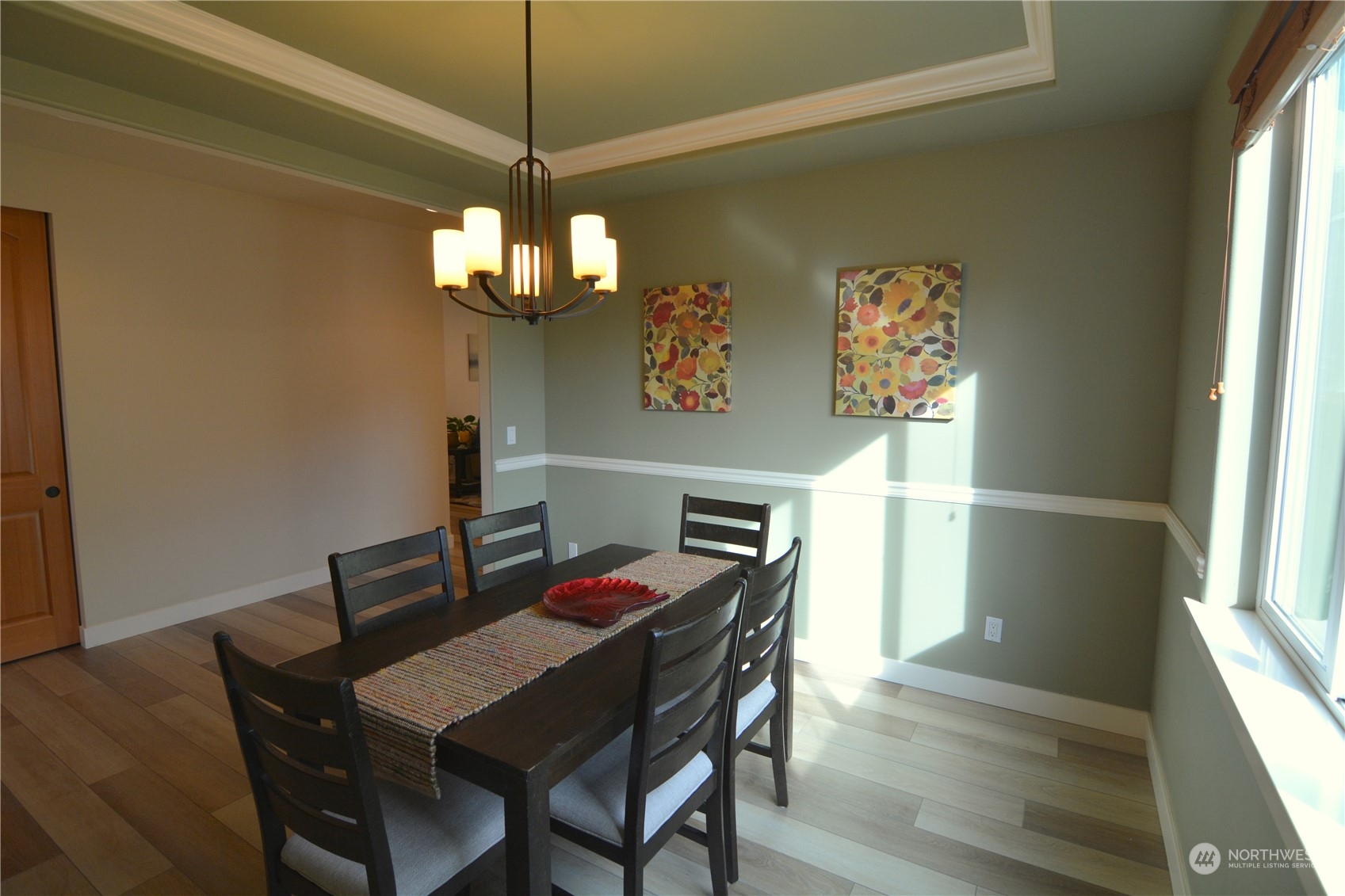 21 233rd Place Southeast Bothell, WA 98021 - Photo 7 of 33 a view of a dining room with furniture window and wooden floor