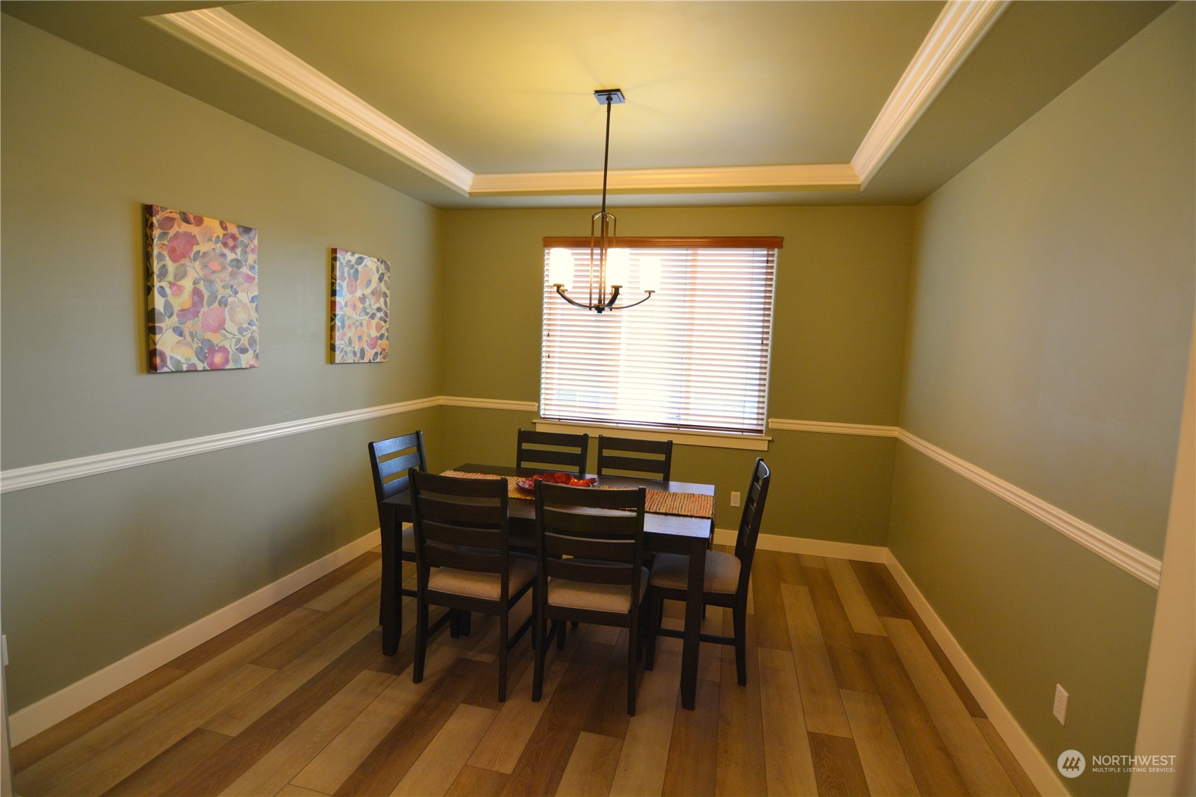 21 233rd Place Southeast Bothell, WA 98021 - Photo 8 of 33 a view of a dining room with furniture window and wooden floor