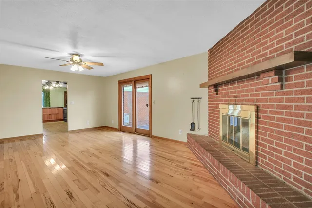 a large kitchen with a cabinets and chandelier