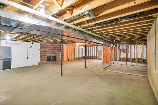 a view of a swimming pool with outdoor seating