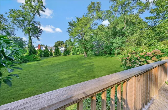a view of a garden from a balcony