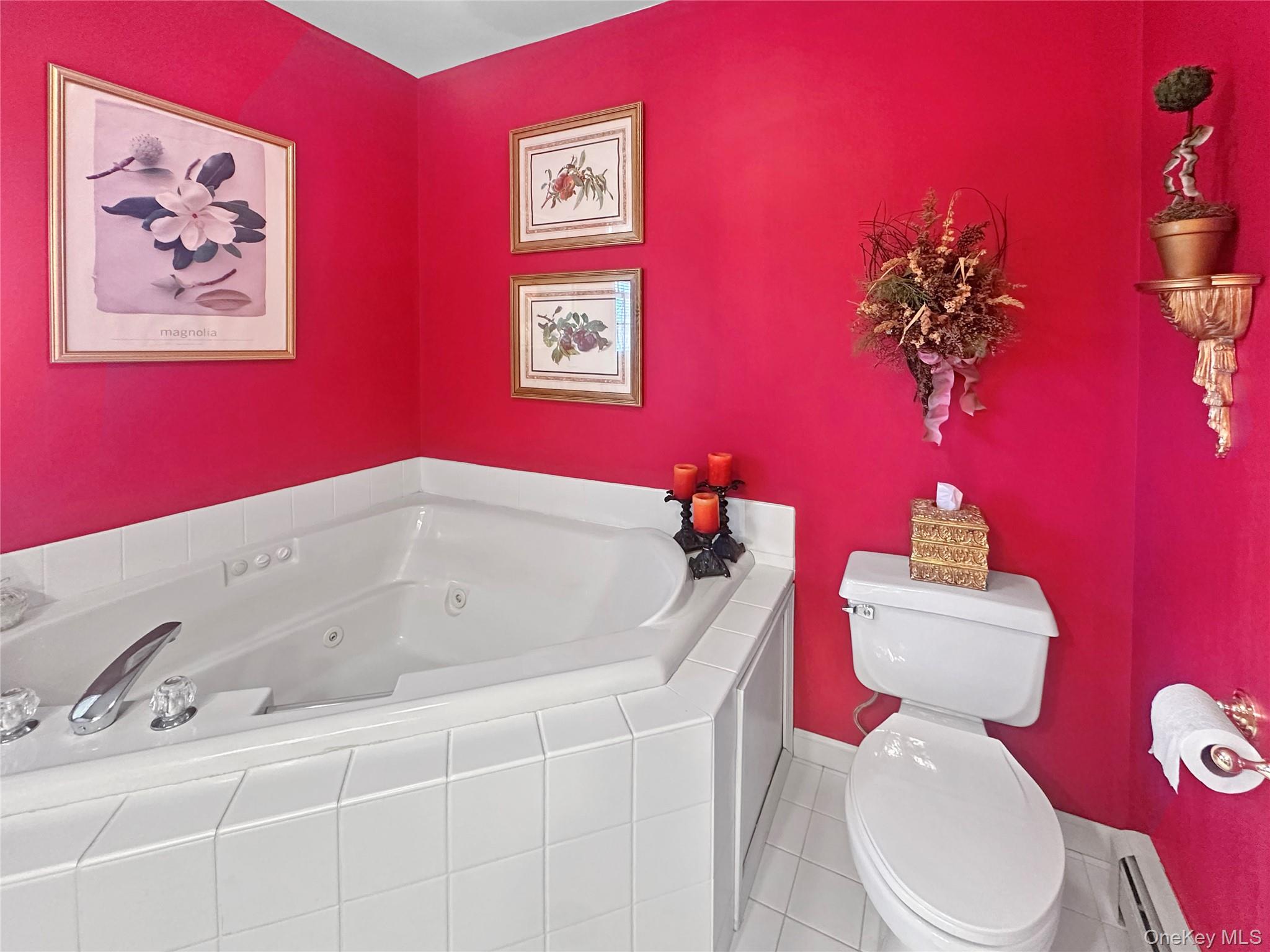 215 Kouros Road New Suffolk, NY 11956 - Photo 19 of 28 a bathroom with a sink mirror and toilet