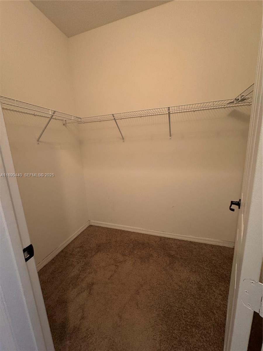 9079 Southwest 35th Street Miramar, FL 33025 - Photo 12 of 21 view of a room with racks on the wall