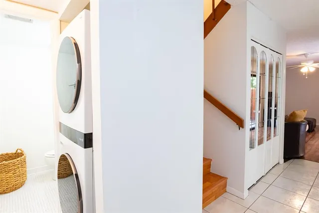 a view of a staircase in a corridor