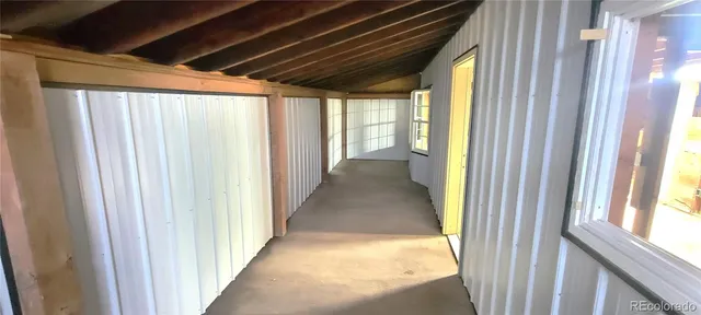 a view of a room with windows