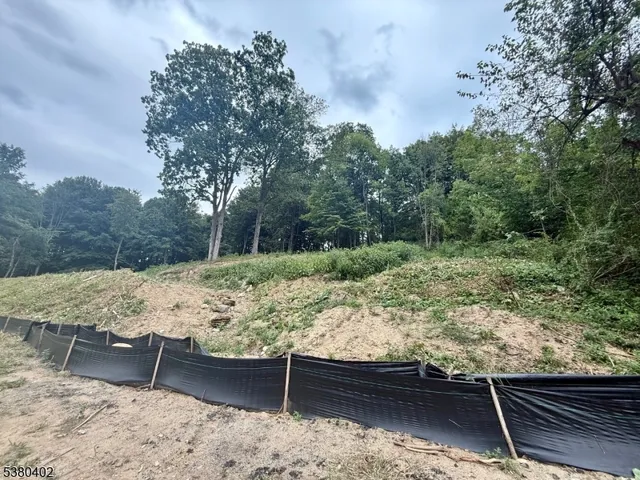 a view of a yard from a balcony