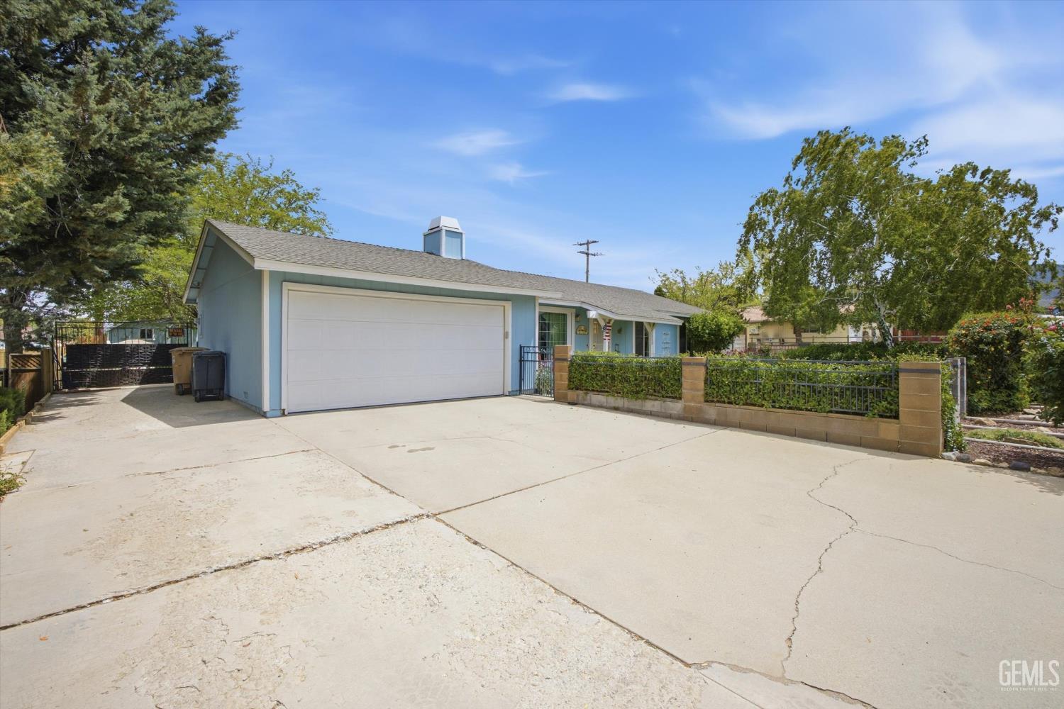 Undisclosed Address Tehachapi, CA 93561 - Photo 12 of 48 front view of a house with a yard