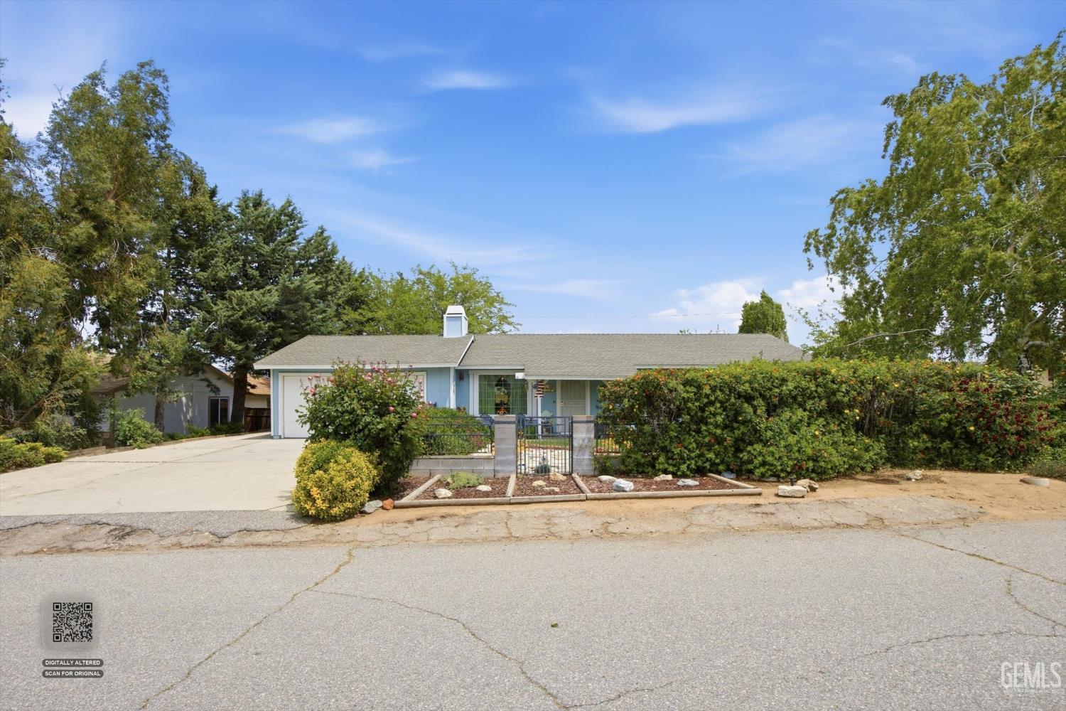 Undisclosed Address Tehachapi, CA 93561 - Photo 14 of 48 a front view of a house with a yard
