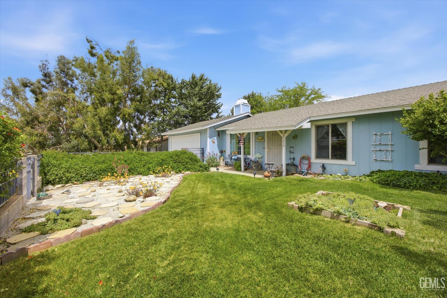 Undisclosed Address Tehachapi, CA 93561 - Photo 16 of 48 a view of a house with a backyard