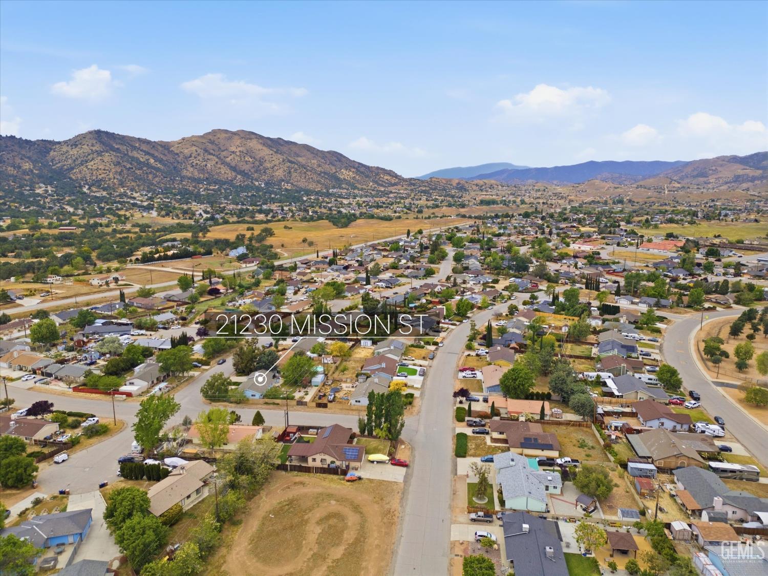 Undisclosed Address Tehachapi, CA 93561 - Photo 4 of 48 an aerial view of residential houses with outdoor space and trees