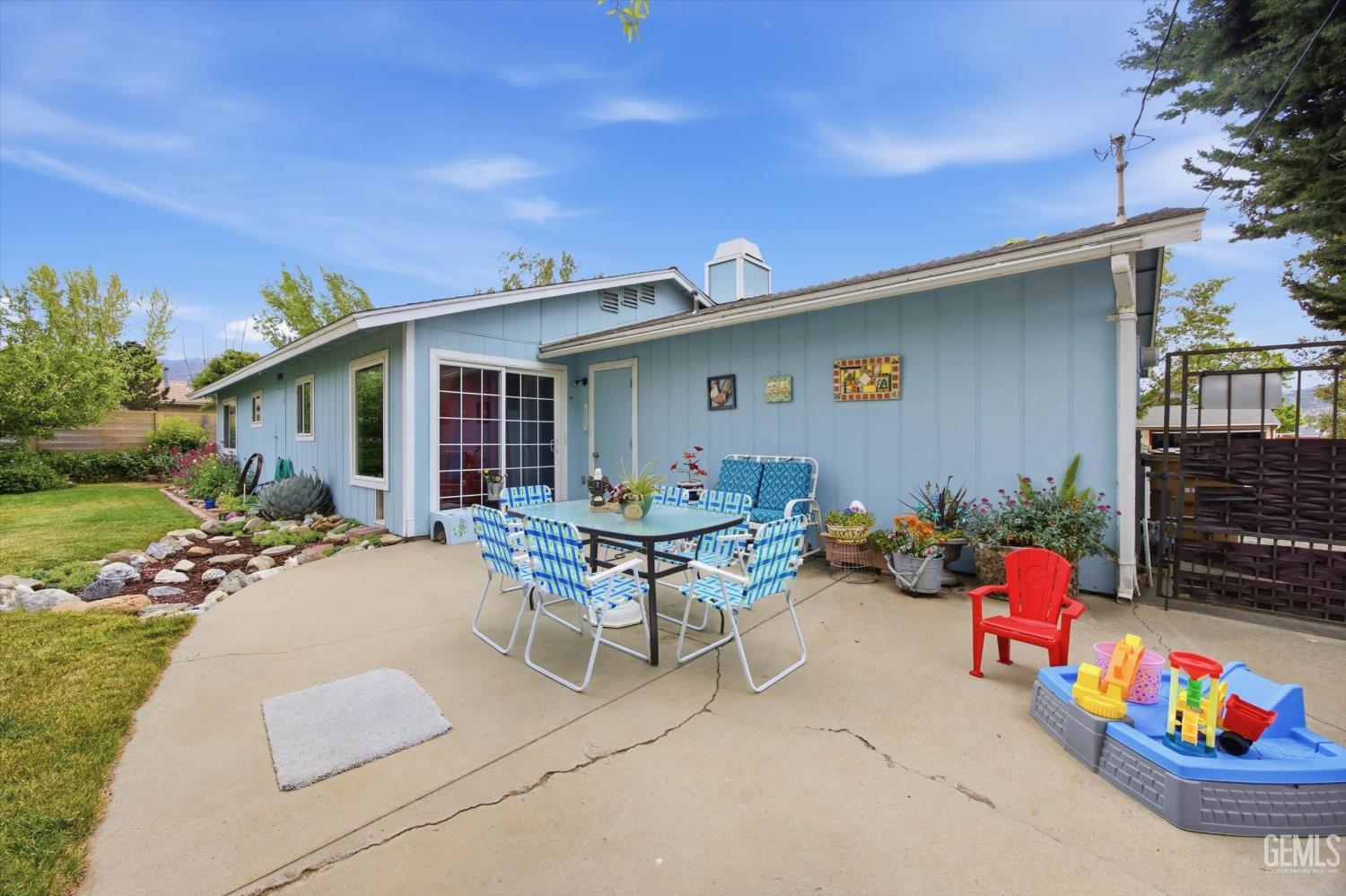 Undisclosed Address Tehachapi, CA 93561 - Photo 41 of 48 a backyard of a house with outdoor seating