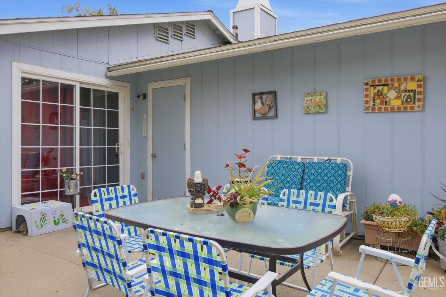 Undisclosed Address Tehachapi, CA 93561 - Photo 42 of 48 a view of a dining table and chairs in the patio