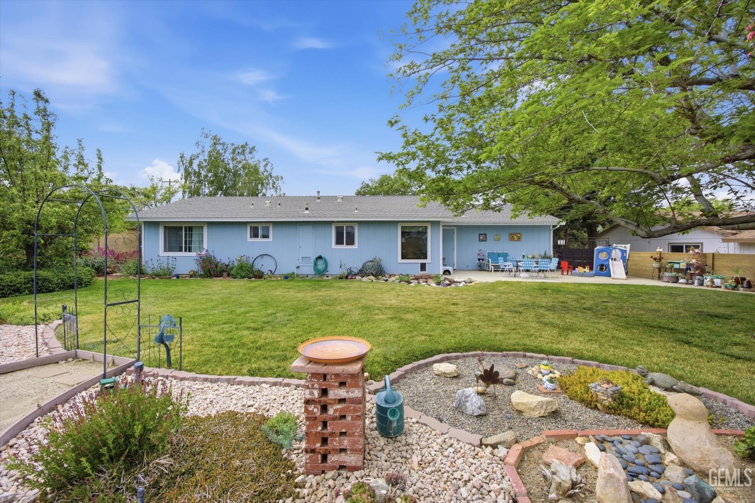 Undisclosed Address Tehachapi, CA 93561 - Photo 45 of 48 a view of a house with a backyard