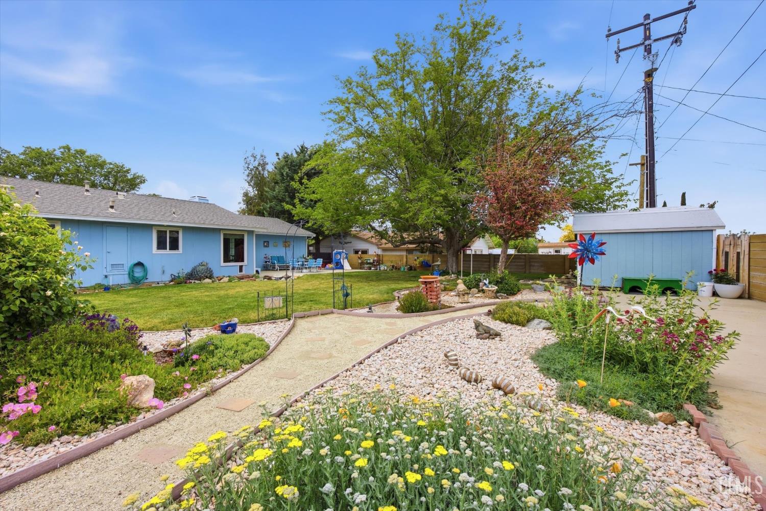 Undisclosed Address Tehachapi, CA 93561 - Photo 46 of 48 a front view of a house with a yard and outdoor seating