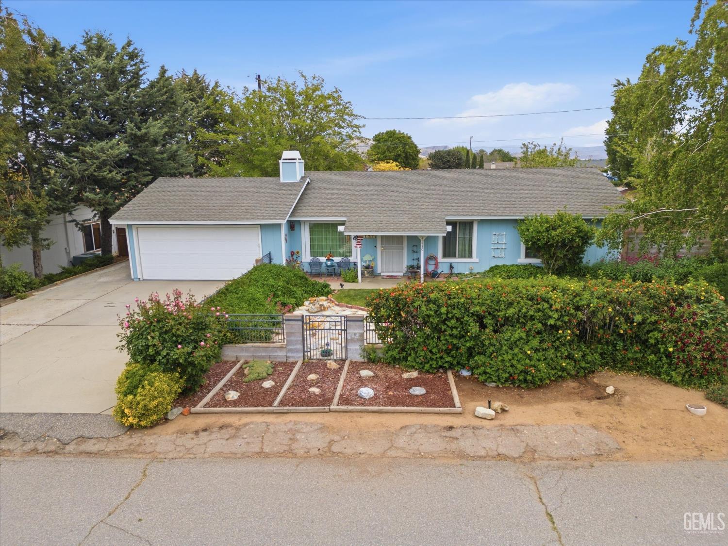 Undisclosed Address Tehachapi, CA 93561 - Photo 7 of 48 front view of house with a yard