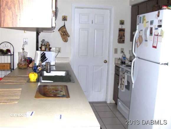 5494 Riverside Drive Port Orange, FL 32127 - Photo 3 of 13 a view of a living room and bathroom