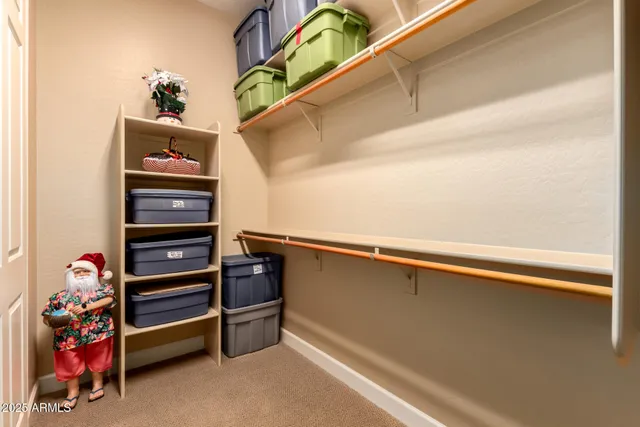 a view of a brick house with a yard