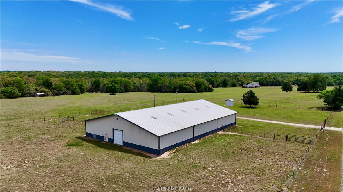 10432 Sammys Road Bremond, TX 76629 - Photo 32 of 47 a view of a backyard with an outdoor space
